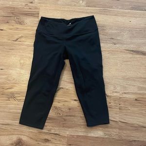 NWOT size medium petite Athleta crop black leggings.